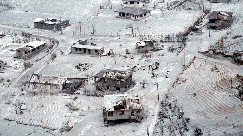 Destroyed houses on the northeast part of Montserrat island after the eruption of the Soufriere Hills volcano in 1997.
